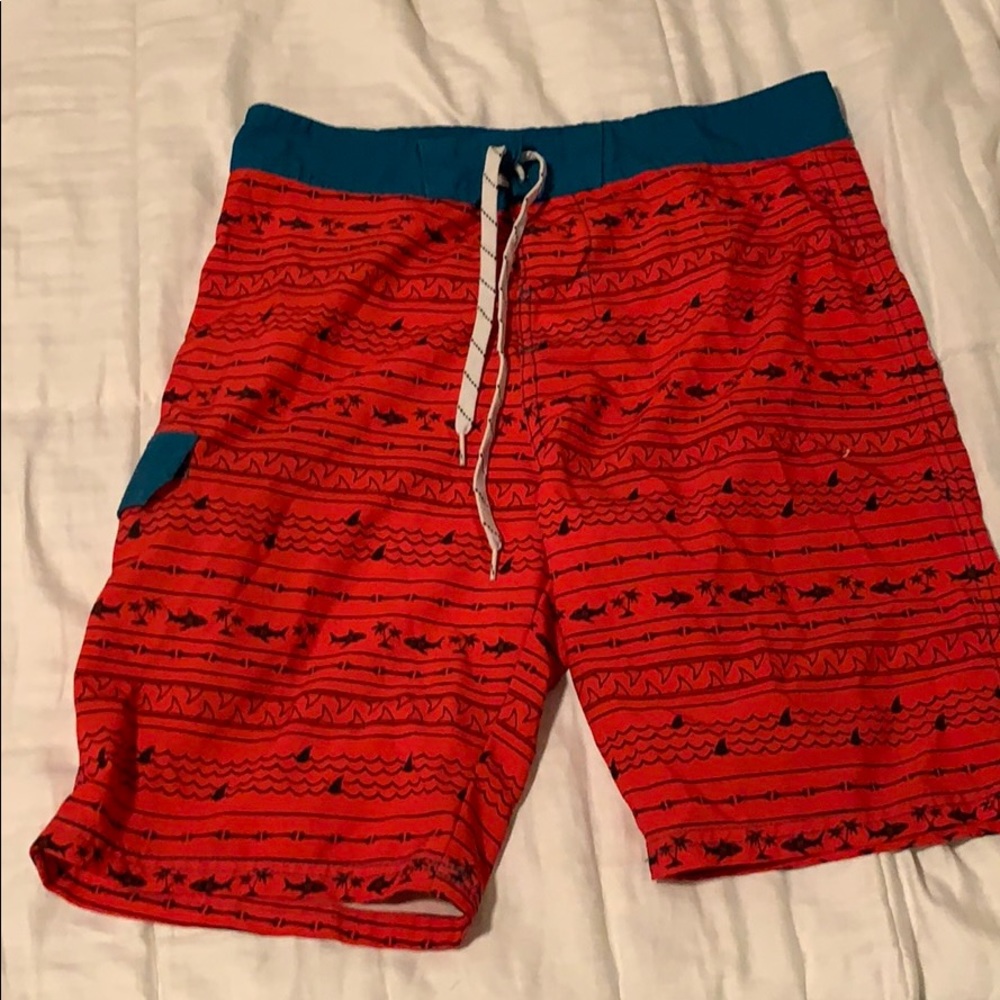 Palm tree and shark swim trunks